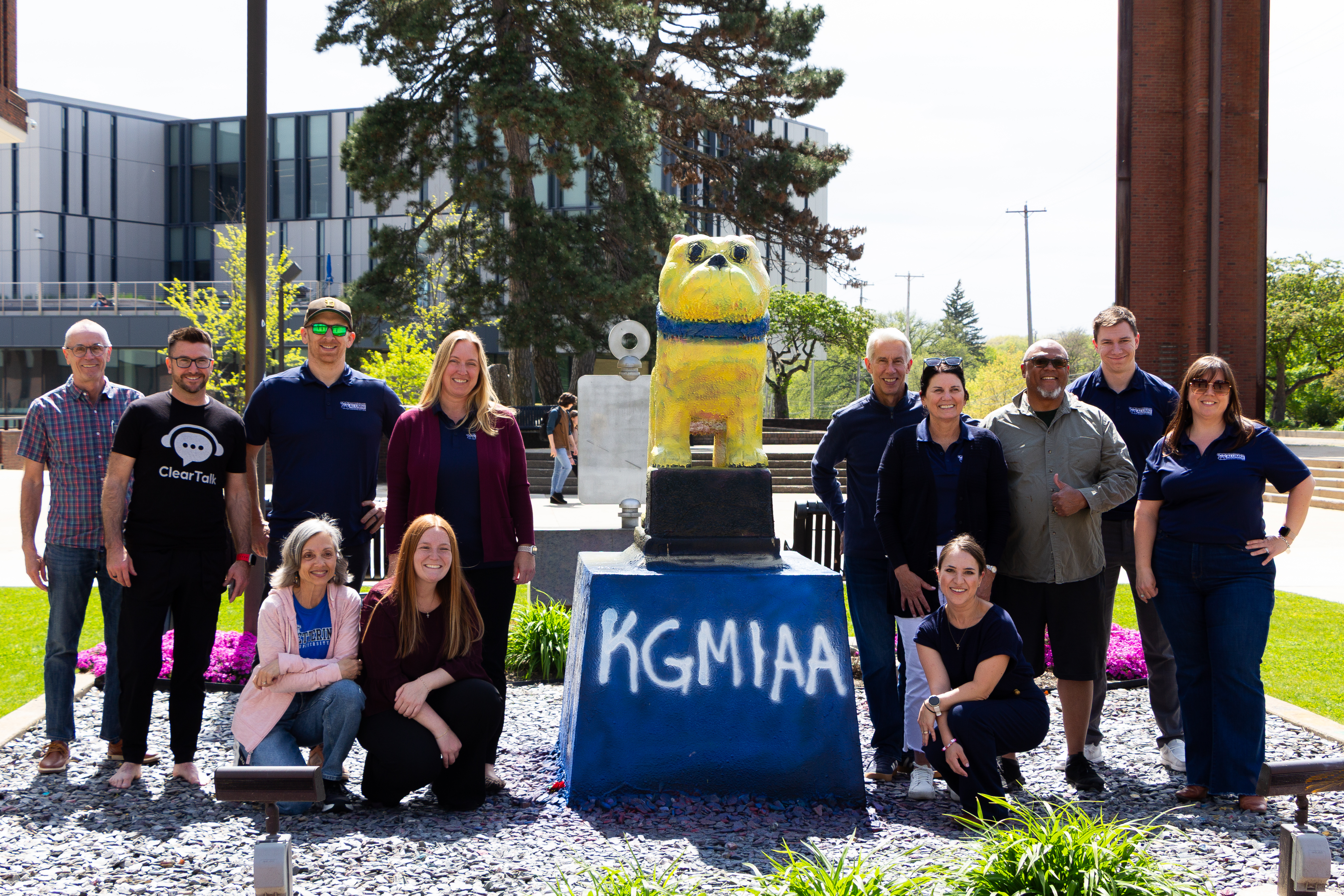 Kettering University Board of Directors paint the Bulldog mascot statue