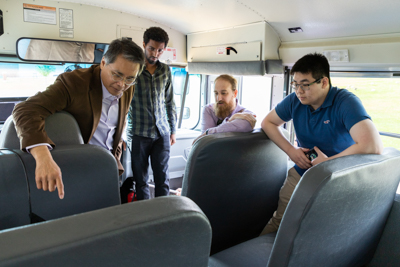 Navistar employees speak with Kettering University students about their work.