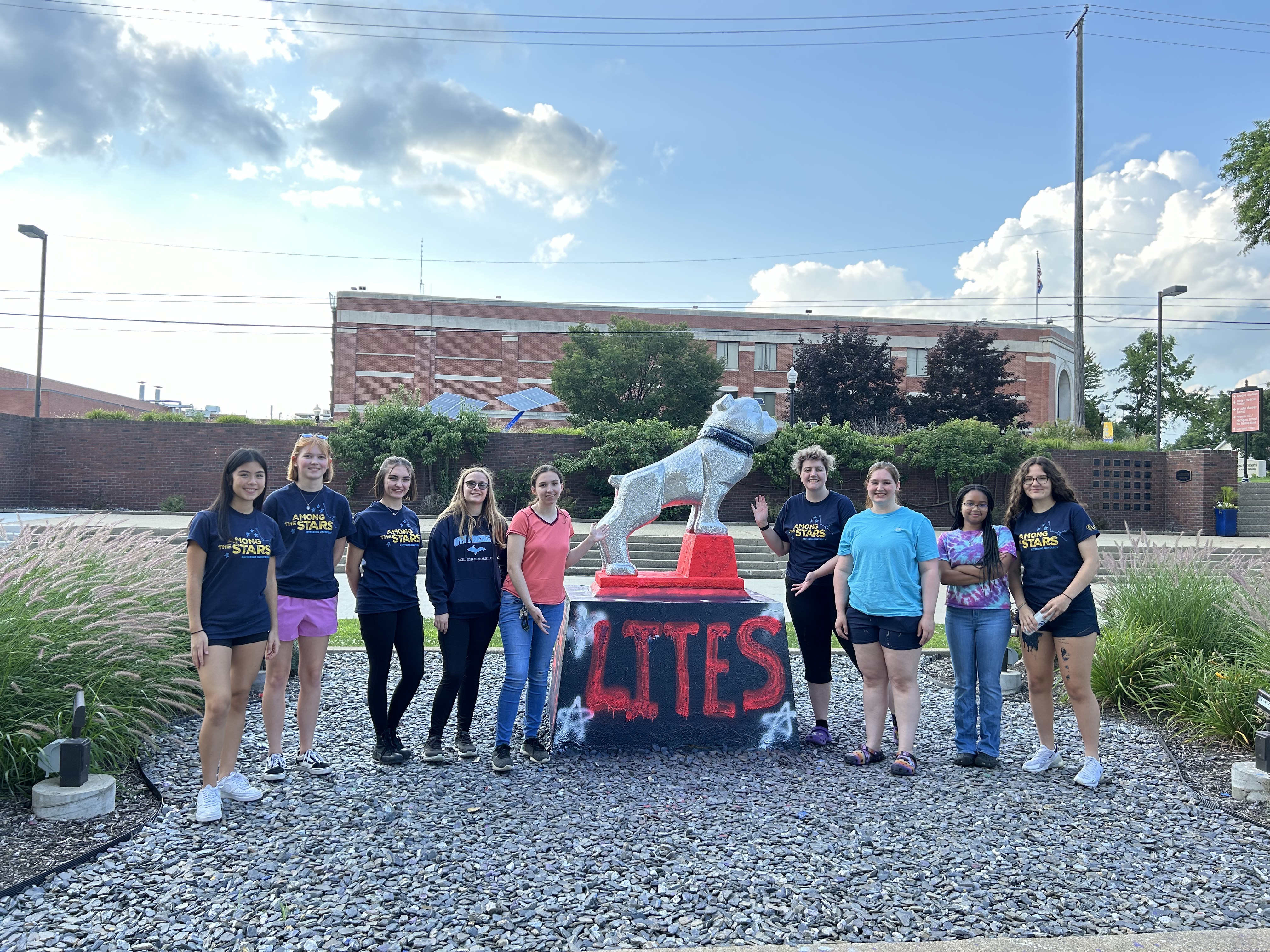 LITES students standing with Bulldog statue