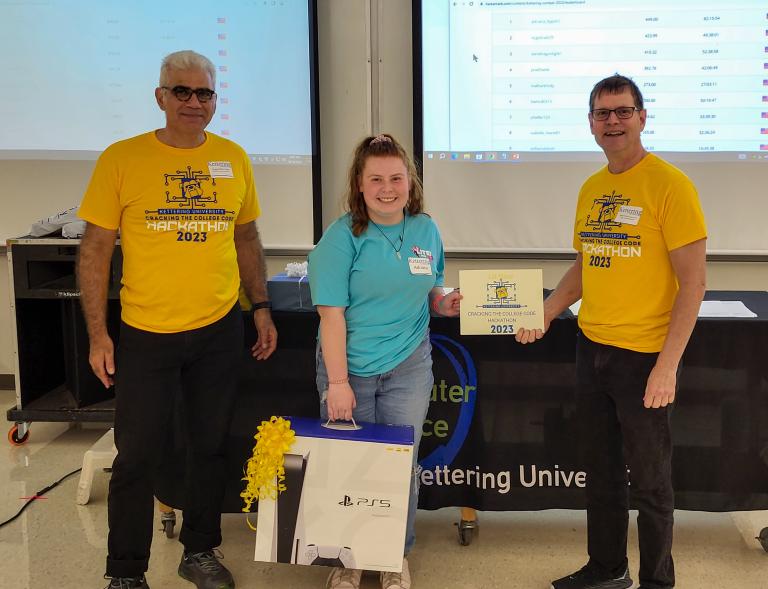 From left, Dr. Babak Elahi, Dean of the College of Sciences and Liberal Arts, Adriana Lippolis, first-place winner and Dr. Michael Farmer, Head of the Department of Computer Science at Kettering University.