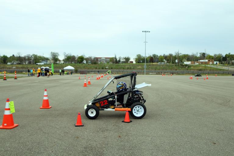 A high school student drives a go kart during the 2019 Square One's Innovative Vehicle Design Challenge at Kettering University.