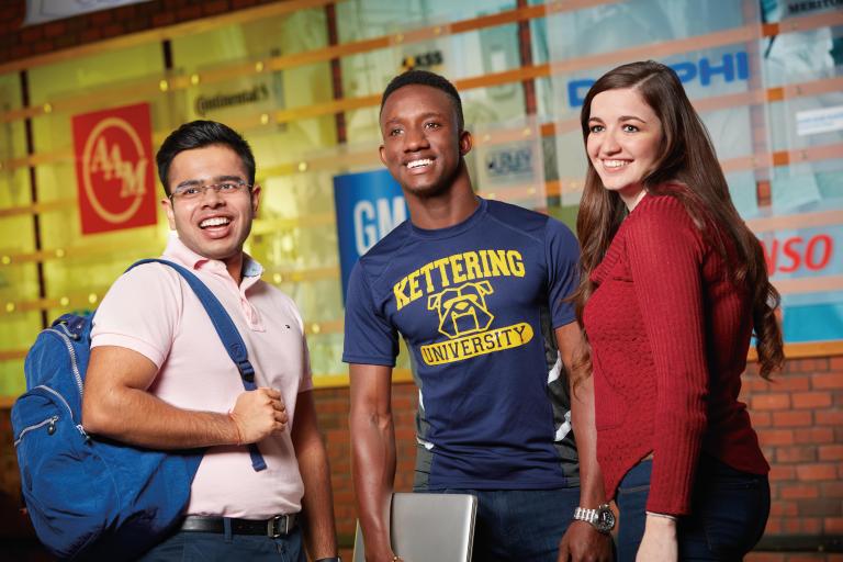 Students in the Campus Center in front of the Employer Wall