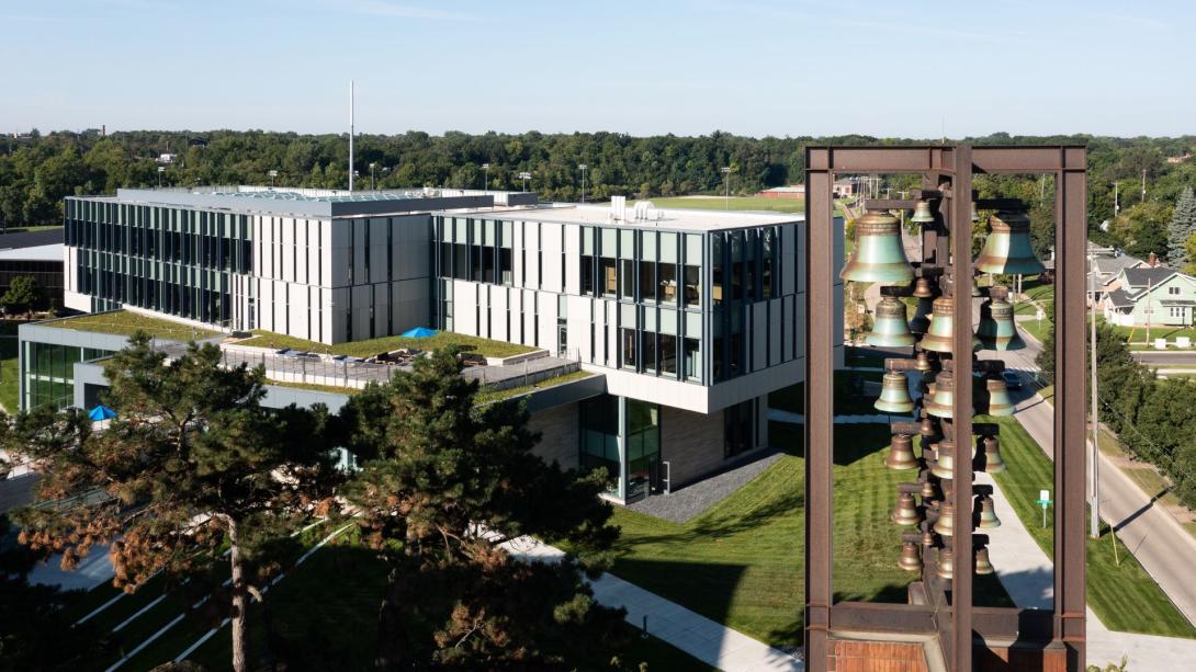 An aerial view of Kettering's bell tower in the foreground and the Learning Commons in the background