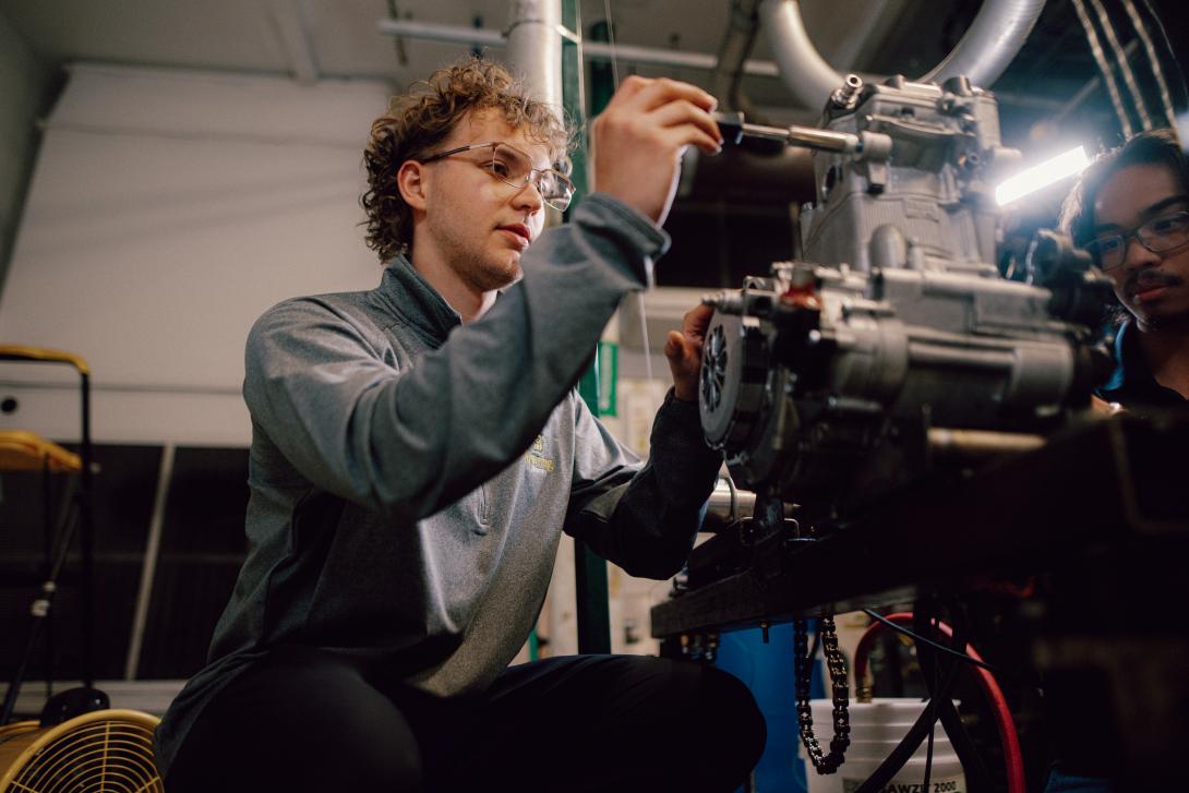 Students working in the jet engine lab