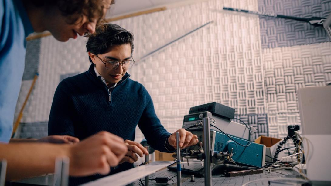 Two students working in the Acoustics Lab