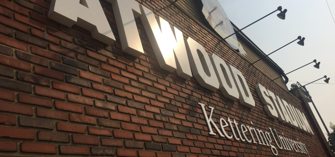 Exterior view of Atwood Stadium with prominent signage and Kettering University branding on a brick facade.