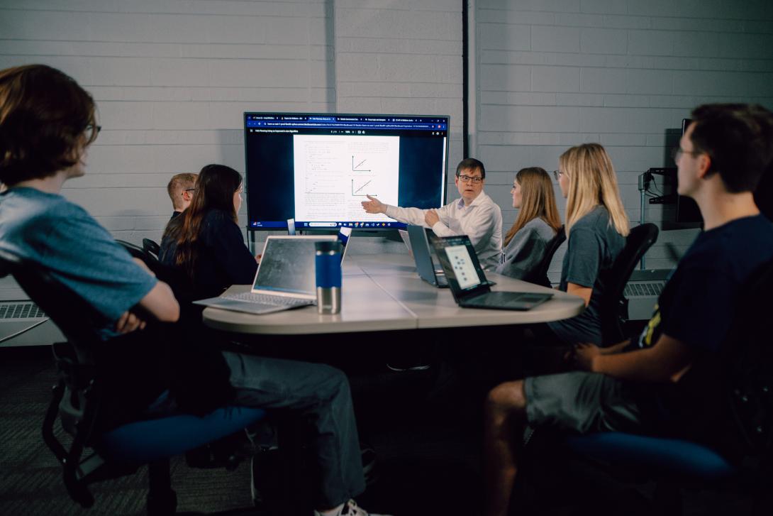 professor teaching students in class