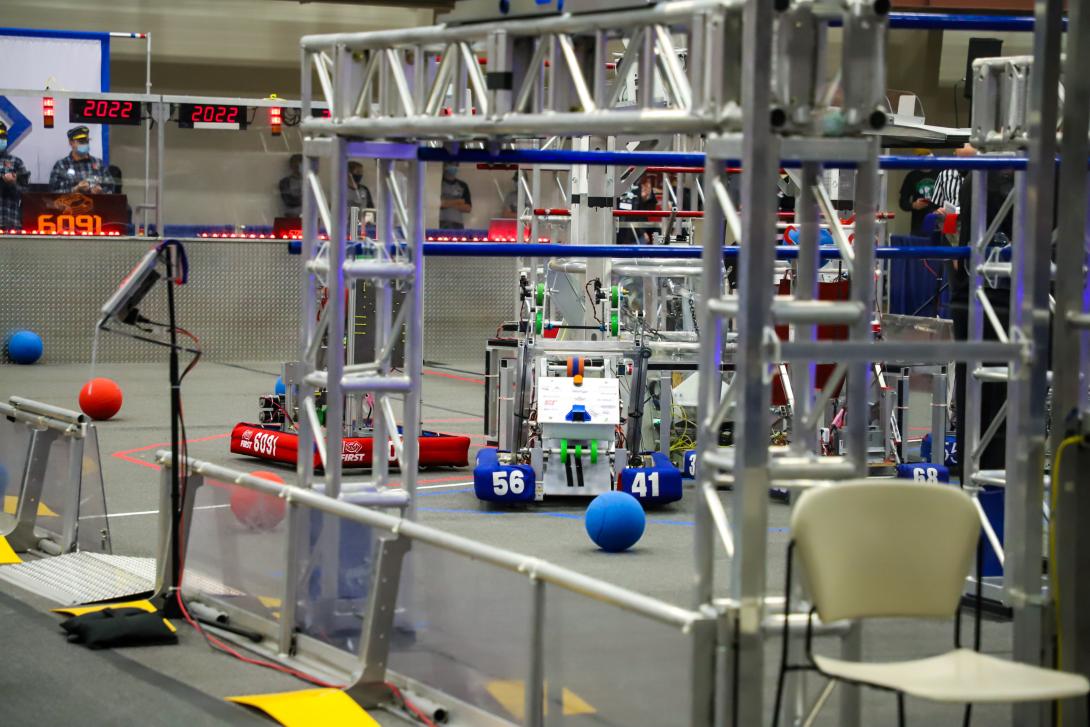 FIRST robotics team robot on playing field