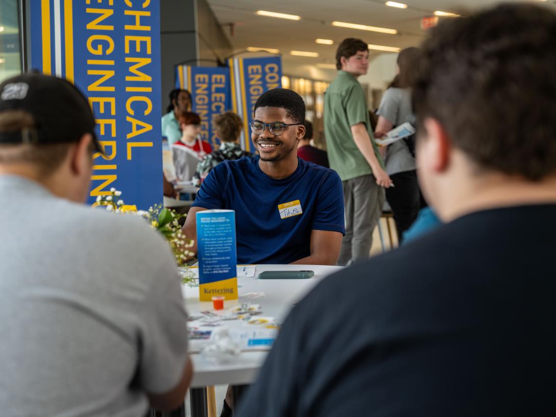 Student sitting at event